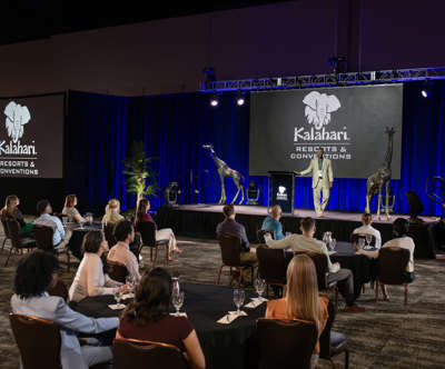 Man standing up giving a presentation